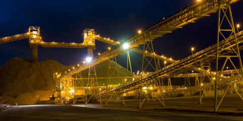 night time gold mine processing ore.