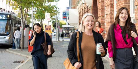 Postgrad students chat as they grab a coffee at the Curtin campus in Perth city