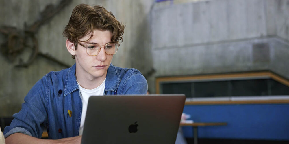 A student studies on a laptop