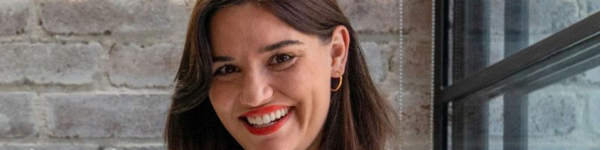 Photo of guest speaker Anna Guerrero smiling at the camera
