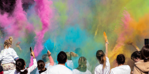 People participating at the Coulour Run with colour powder